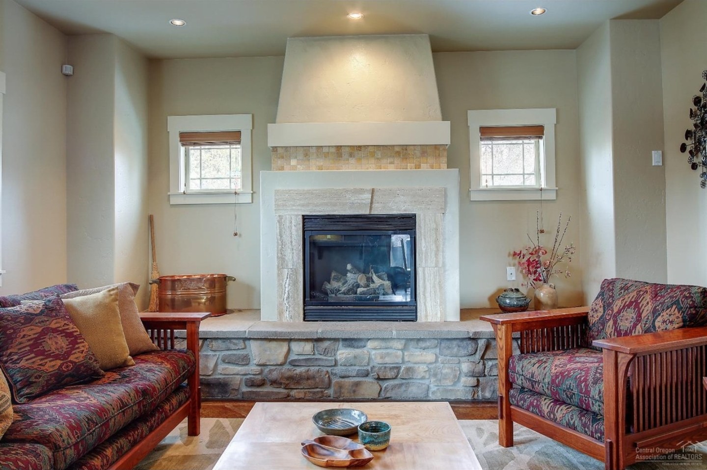 Living room with stone fireplace, 9th St, Central Oregon