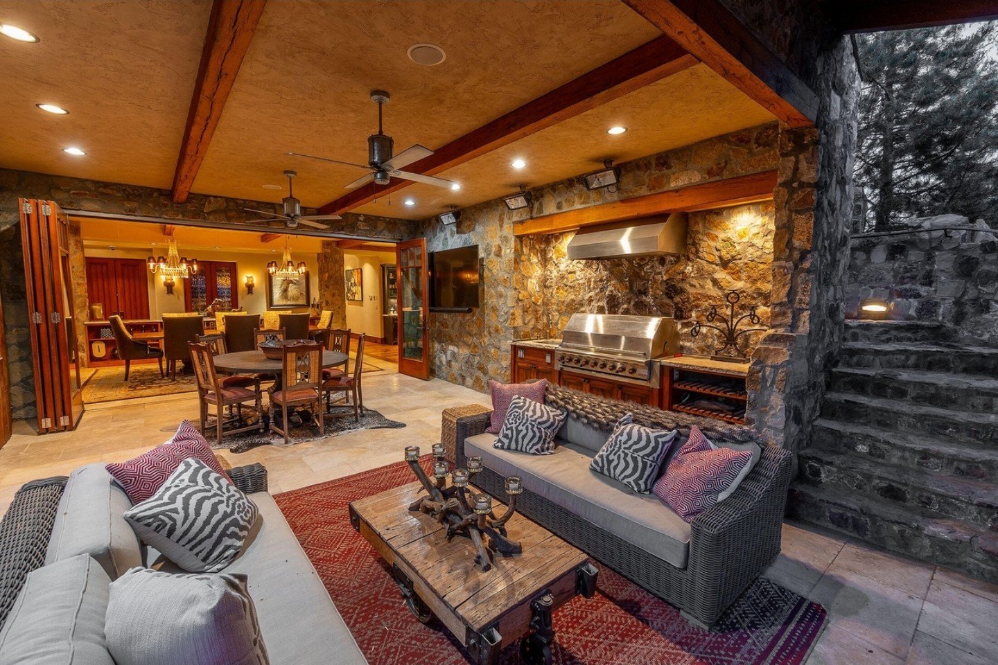 Great room with exposed timber beams, stone fireplace, and open floor plan, Brushline Ct, Pronghorn, Bend, Oregon