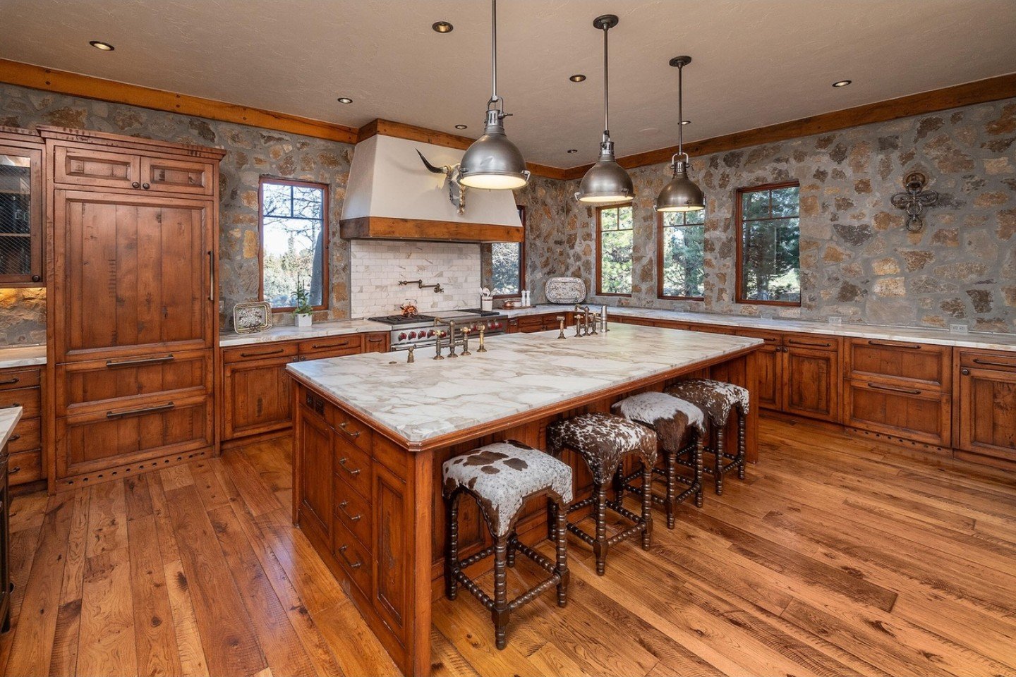 Custom kitchen with large center island and wood cabinetry, Brushline Ct, Pronghorn, Bend, Oregon