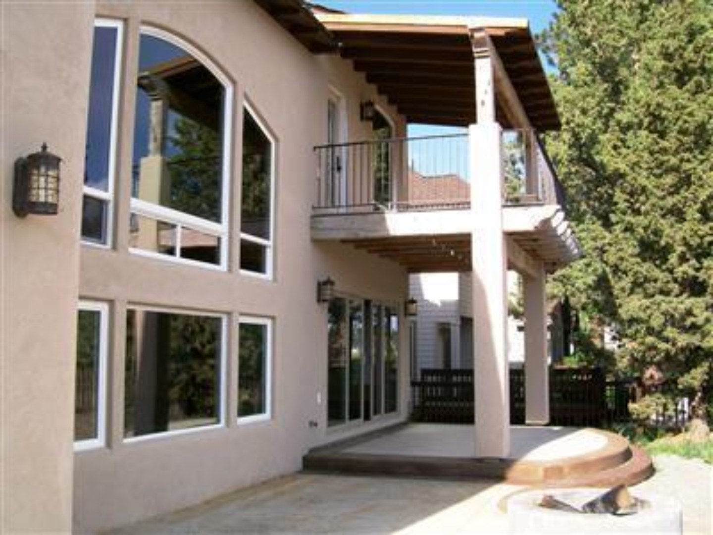 Back courtyard with arched balcony, Ridgewater, Central Oregon