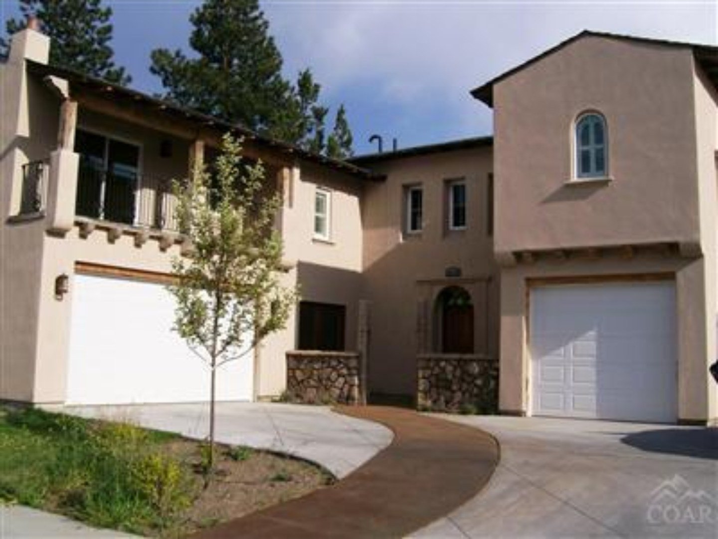 Tuscan-style stucco home with arched courtyard, Ridgewater, Central Oregon