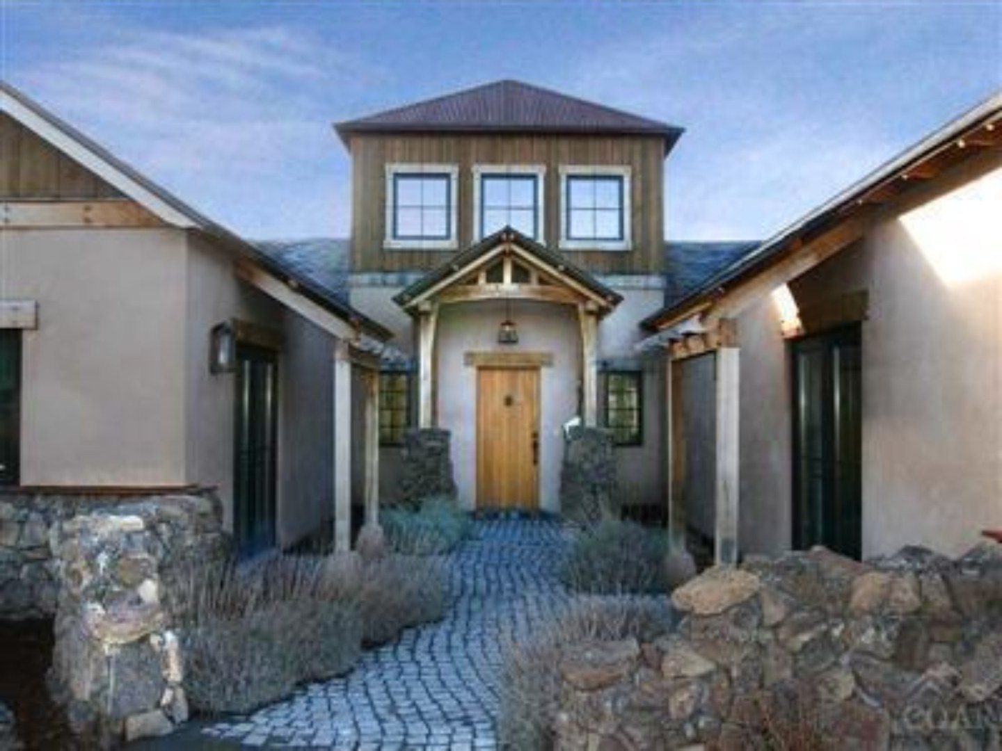 Tuscan-style stone and stucco home entry, Sage Canyon, Pronghorn, Bend, Oregon