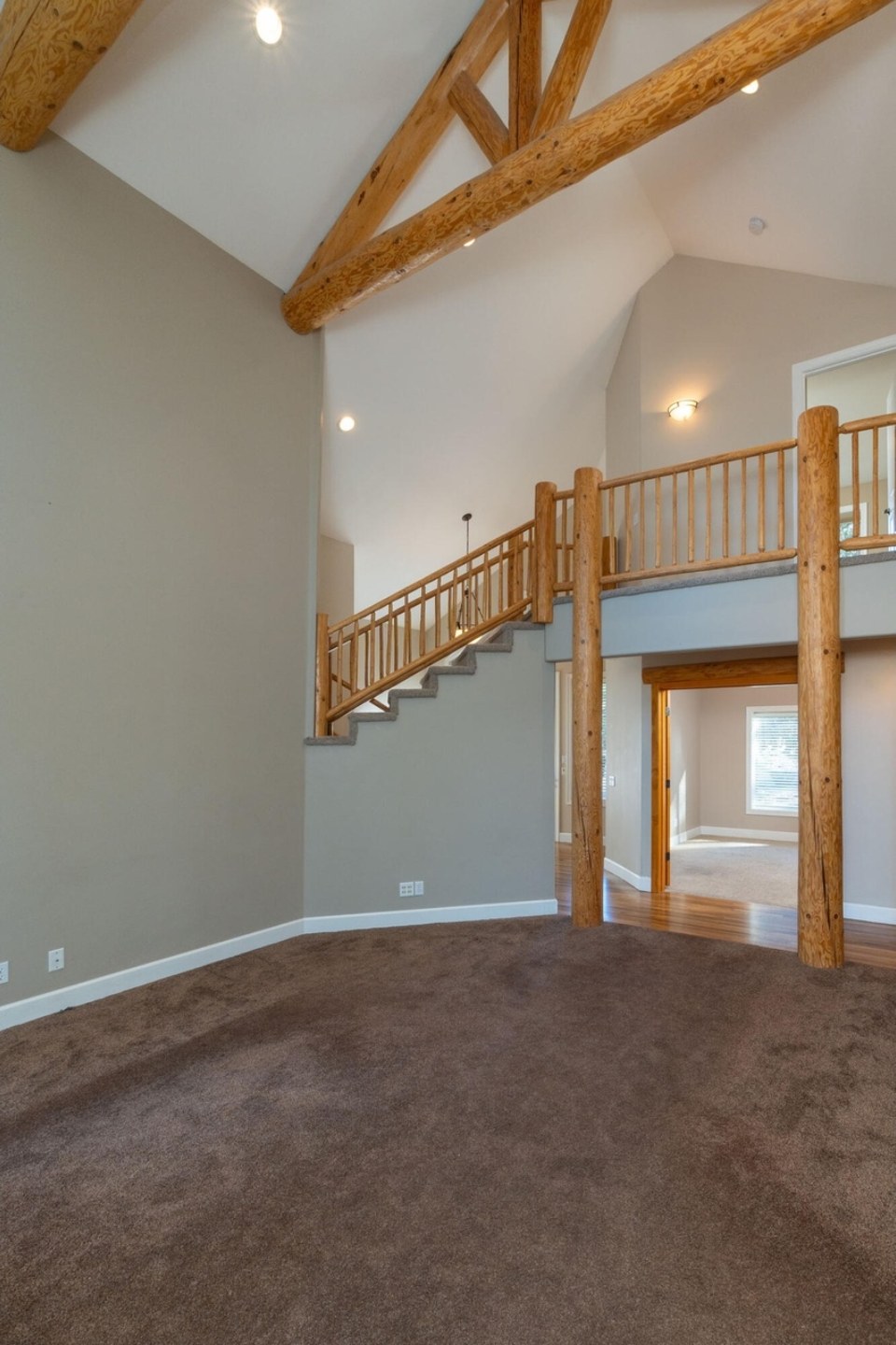 Loft with exposed timber trusses and stairway, Zircon, Central Oregon